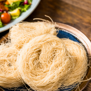 overhead-view-rice-vermicelli-plate-desk